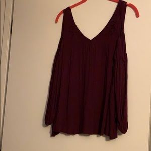 Burgundy top (exposed shoulders)